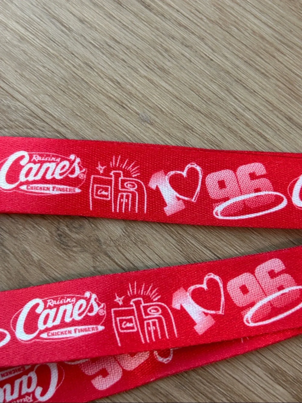 Raising Cane's Red Logo Lanyard with 2 Raising Cane’s Keychains bundle NEW